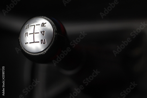 black gear lever with silver surface, five-speed gearbox