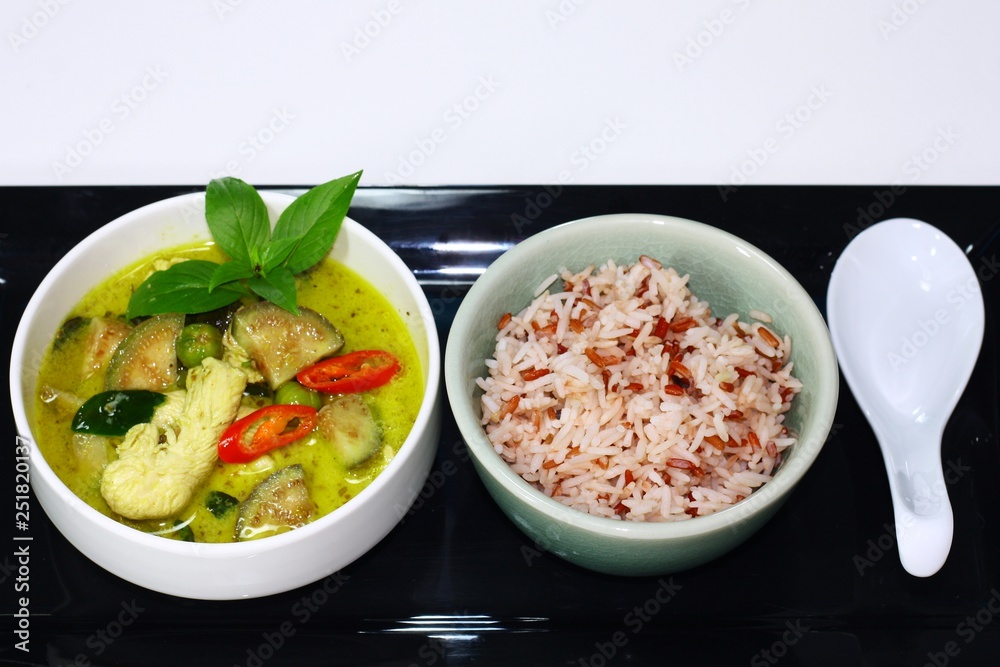 Thai Green curry chicken served with brown rice. Thai Green curry chicken served with brown rice.