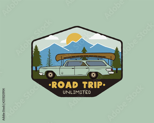 Vintage hand drawn road trip logo patch with carriding through the mountains landscape and quote - Road trip unlimited. Old style outdoors camping emblem in retro style for prints. Stock vector