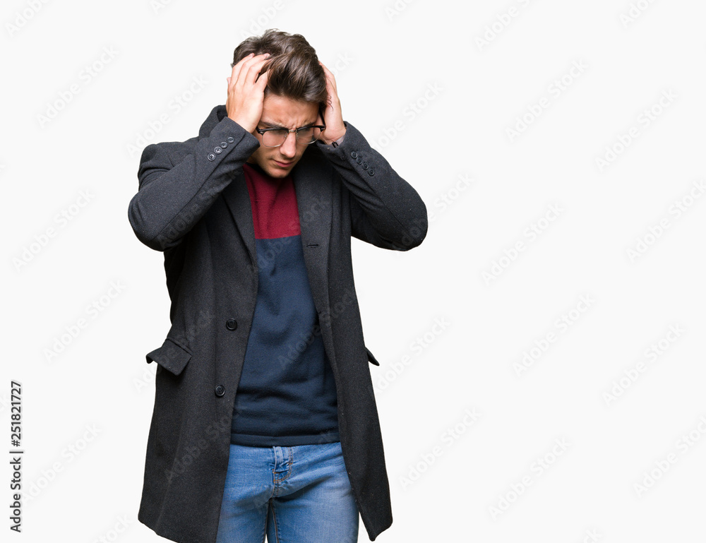 Young handsome elegant man wearing glasses over isolated background suffering from headache desperate and stressed because pain and migraine. Hands on head. Young handsome elegant man wearing glasses over isolated background suffering from headache desperate and stressed because pain and migraine. Hands on head.