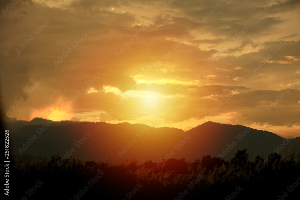 Orange sky from sun ray during sunset - sunrise, Dawn over the mountain