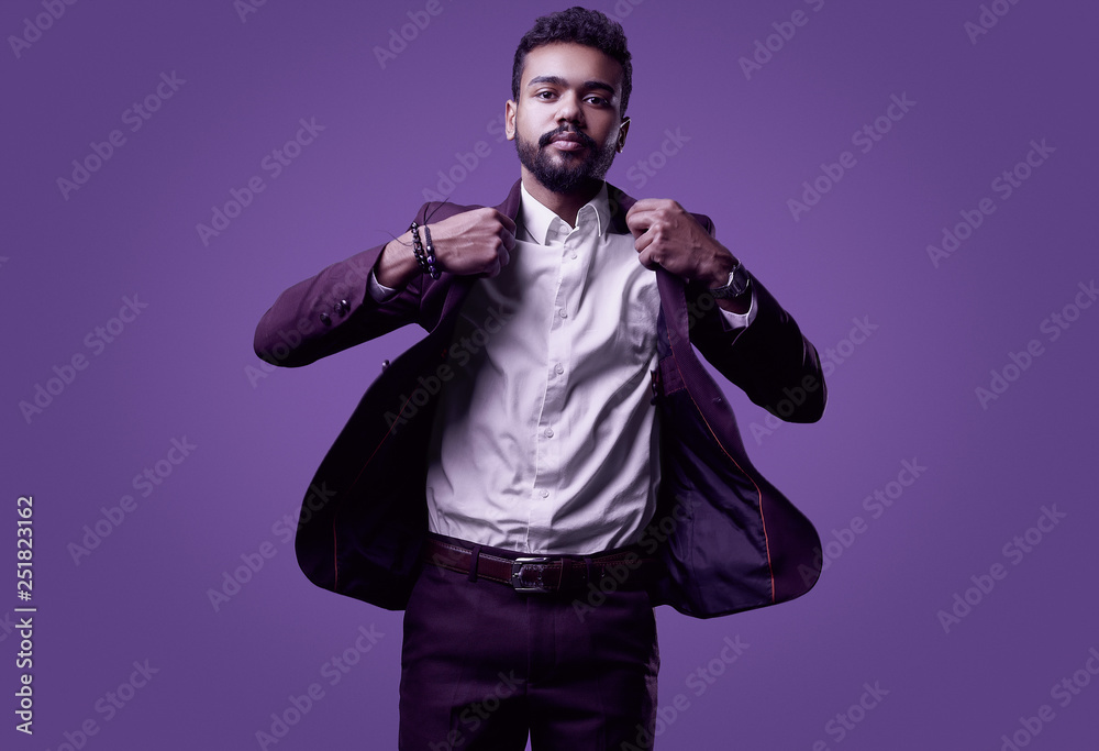 Brutal young African American male model in formal fashion suit Brutal young African American male model in formal fashion suit