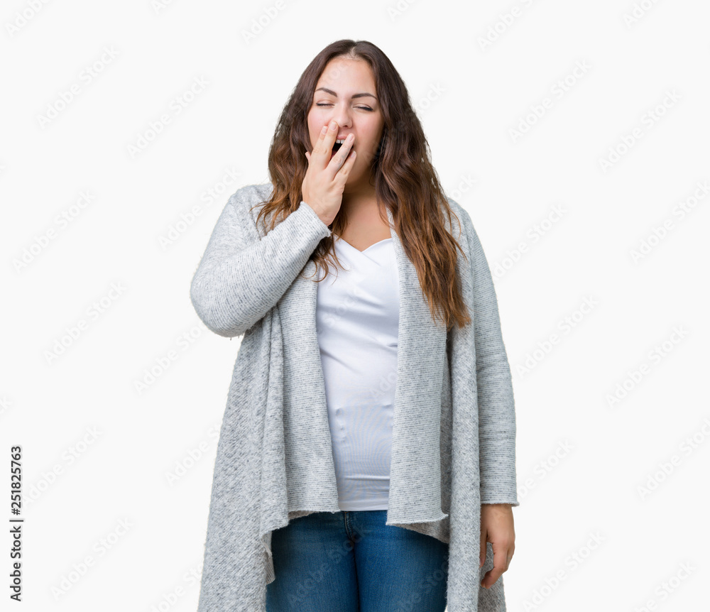 Beautiful plus size young woman wearing winter jacket over isolated background bored yawning tired covering mouth with hand. Restless and sleepiness. Beautiful plus size young woman wearing winter jacket over isolated background bored yawning tired covering mouth with hand. Restless and sleepiness.