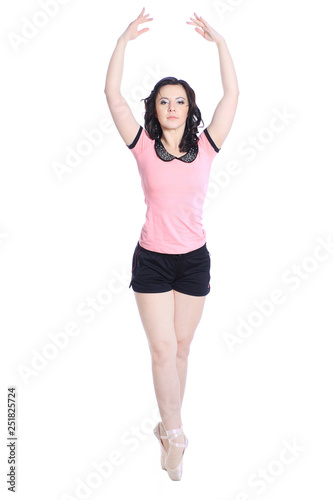 portrait of a woman dancer on Pointe. isolated on white