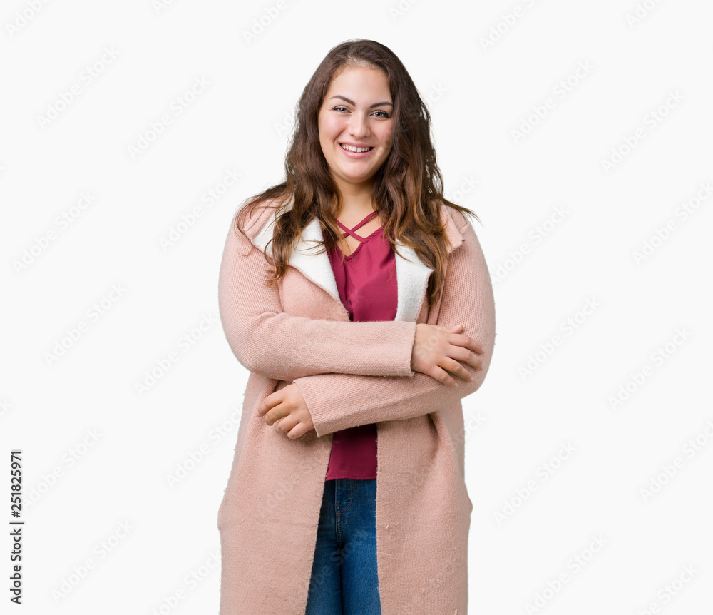 Beautiful plus size young woman wearing winter coat over isolated background happy face smiling with crossed arms looking at the camera. Positive person. Beautiful plus size young woman wearing winter coat over isolated background happy face smiling with crossed arms looking at the camera. Positive person.