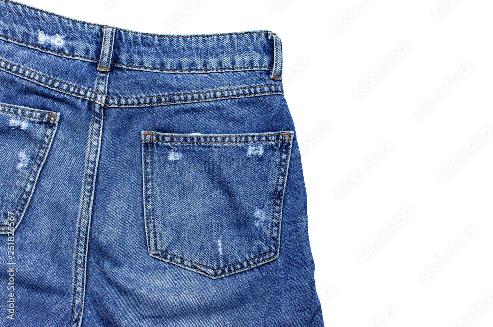 Blue jeans isolated on white background top view flat lay. Detail of nice blue jeans. Jeans texture or denim background. Trend clothing. Beauty and fashion, clothing concept. Blue jeans isolated on white background top view flat lay. Detail of nice blue jeans. Jeans texture or denim background. Trend clothing. Beauty and fashion, clothing concept.