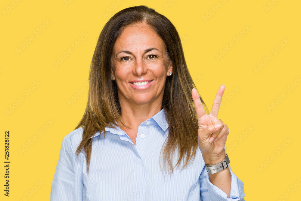 Beautiful middle age business adult woman over isolated background showing and pointing up with fingers number two while smiling confident and happy. Beautiful middle age business adult woman over isolated background showing and pointing up with fingers number two while smiling confident and happy.