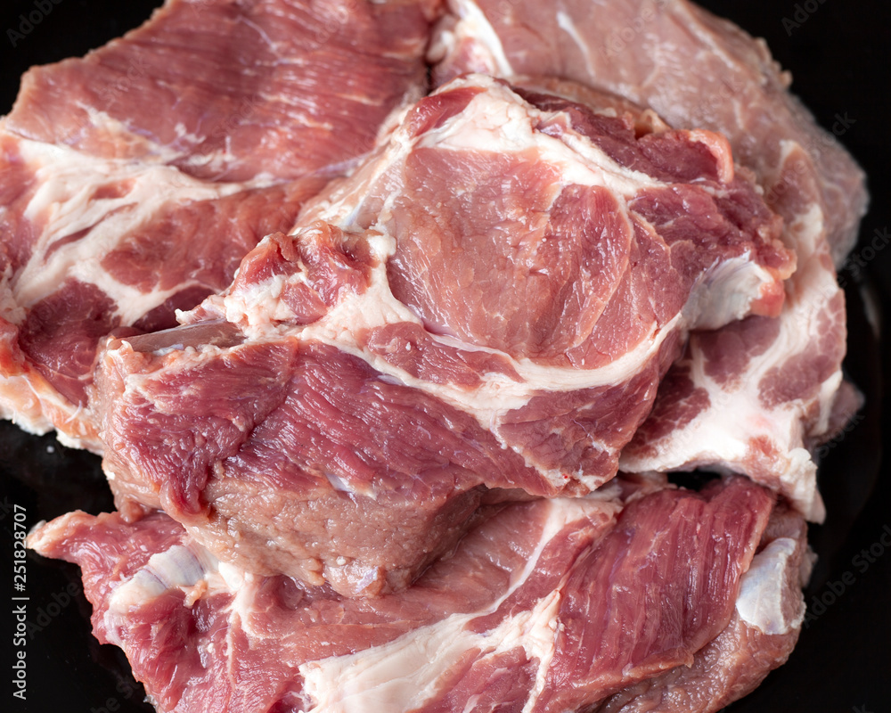 fresh juicy raw meat of pork streaked with fat for cooking delicious steaks fresh juicy raw meat of pork streaked with fat for cooking delicious steaks