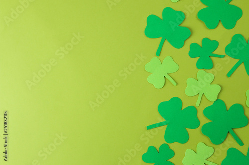 St.Patrick 's Day. celebration. frame of green leaf clover on a bright green background. view from above. space for text