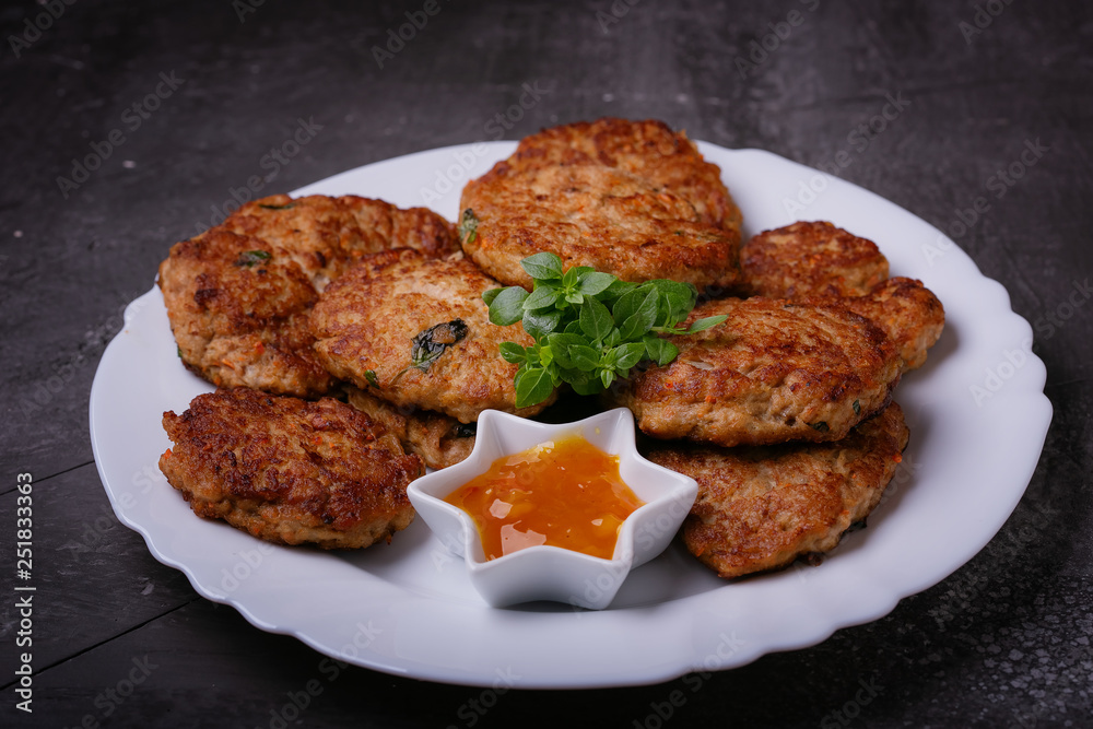 Homemade cutlets from minced fish with sauce Homemade cutlets from minced fish with sauce