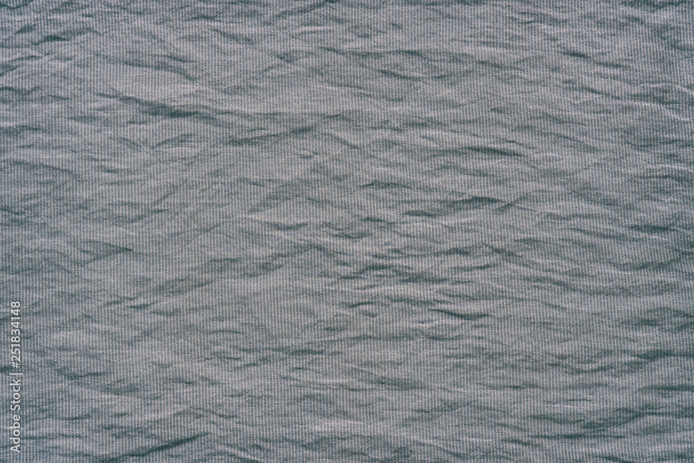Fototapeta premium Texture of gray crumpled fabric for background