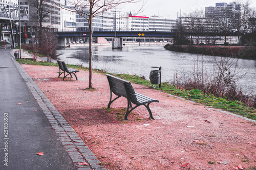 Park bench on the Berliner Promenade on the Saar in Saarbrücken Saarland Germany Europe in blue cool retro look photo