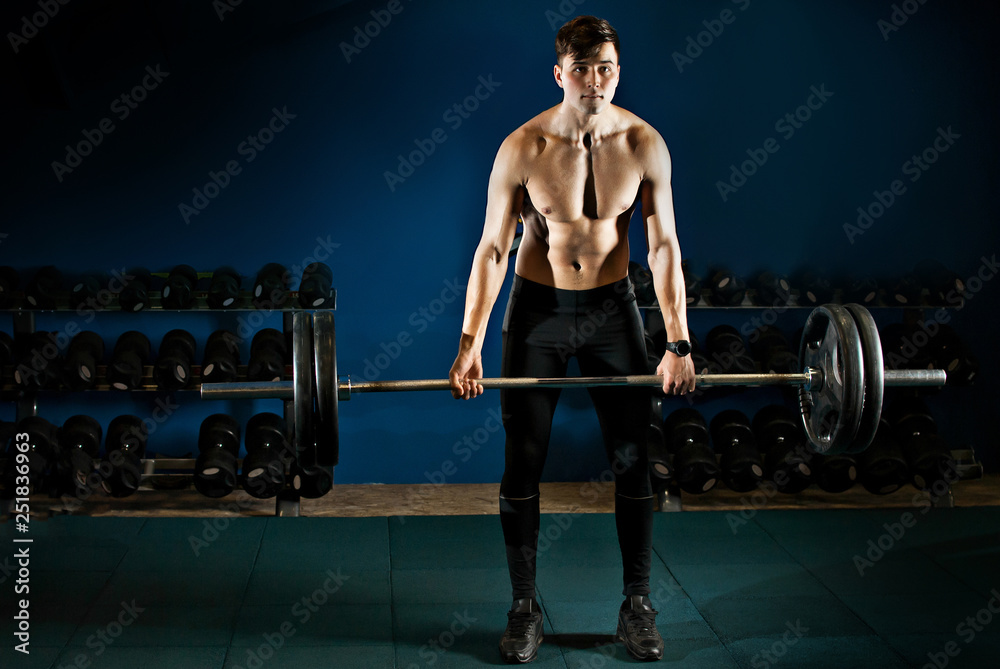 an athlete trains in the gym an athlete trains in the gym
