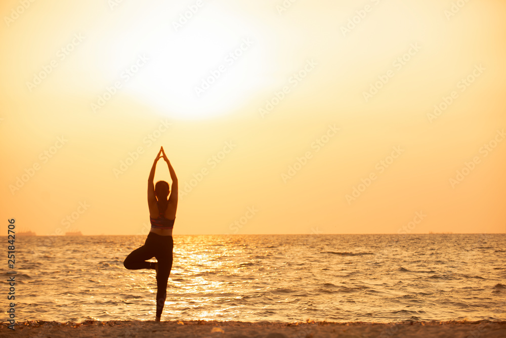 Woman doing yoga  balanced practicing
