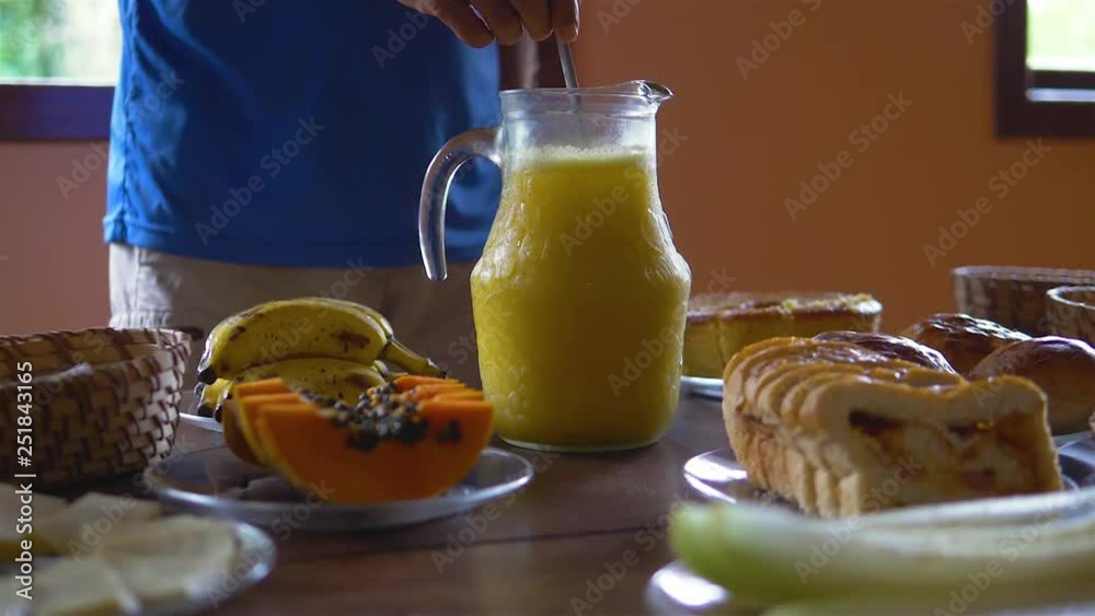 Breakfast at the farm, mixing orange juice Breakfast at the farm, mixing orange juice