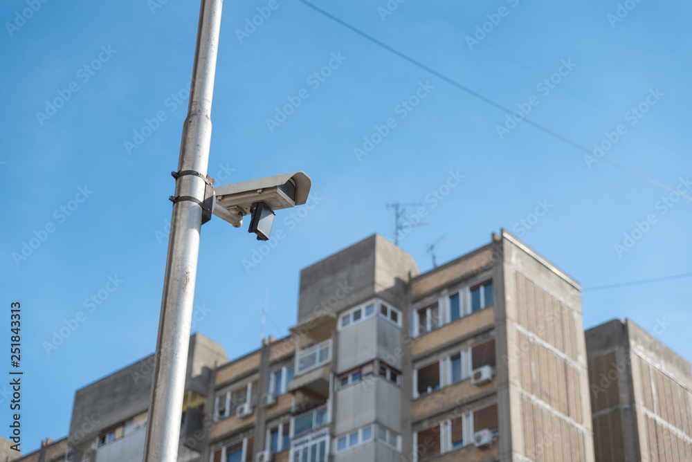 City cctv security surveillance camera system attached on the traffic light pole with clear blue sky background City cctv security surveillance camera system attached on the traffic light pole with clear blue sky background