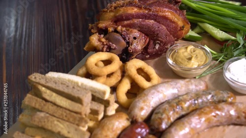 Grilled smoked pork and sausages. Delicios food. Delicious meat dish