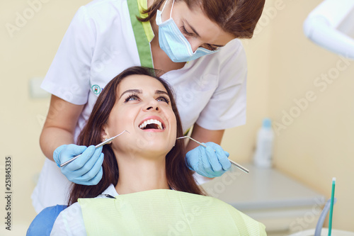 A woman and a dentist in a dental clinic