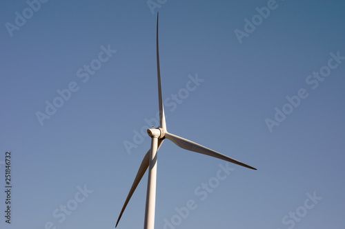Windmill for electric power production © photosis