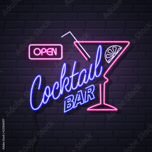Neon sign cocktail bar on brick wall background. Vintage electric signboard.