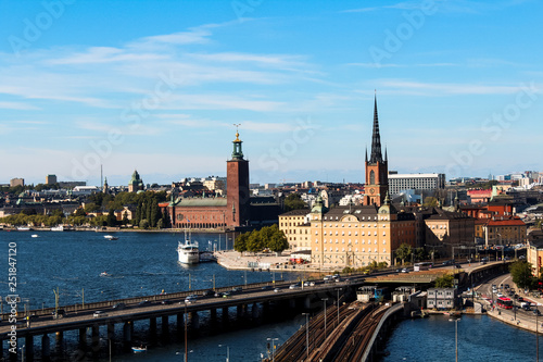 View onto Gamla Stan, Riddarholmskyrkan and Stockholm Stadshus with waterfront as seen from Södermalm during a hot summer day (Stockholm, Sweden, Europe) © Yannik Photography