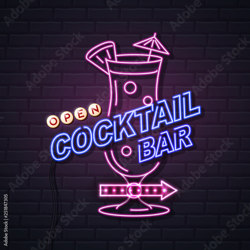 Neon sign cocktail bar on brick wall background. Vintage electric signboard. photo