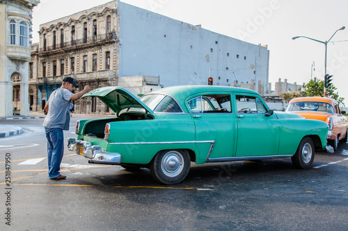 Havana, Cuba - 12 January 2013: The streets of Havana with very old American cars