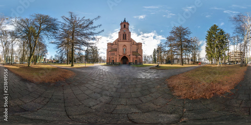 DRUSKENINKAI, LITVA - DECEMBER 2018: full seamless spherical panorama 360 degrees angle view provincial town near catholic gothic church in equirectangular projection, VR AR virtual reality content
