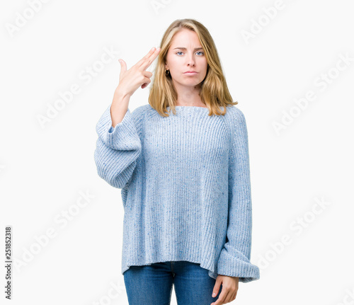 Photography Beautiful young woman wearing blue sweater over isolated background Shooting and killing oneself pointing hand and fingers to head, suicide gesture