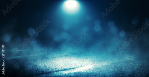 Background scene of empty street lit by spotlight. Neon light, smoke. Abstract background with bokeh
