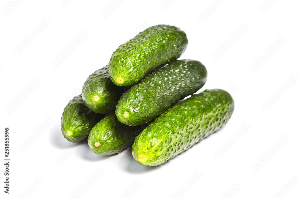 Heap of whole green gherkins isolated on white background Heap of whole green gherkins isolated on white background