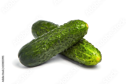 Two gherkins isolated on white background