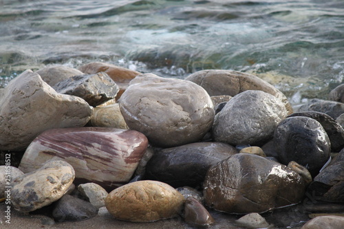 Wet stones by the sea.