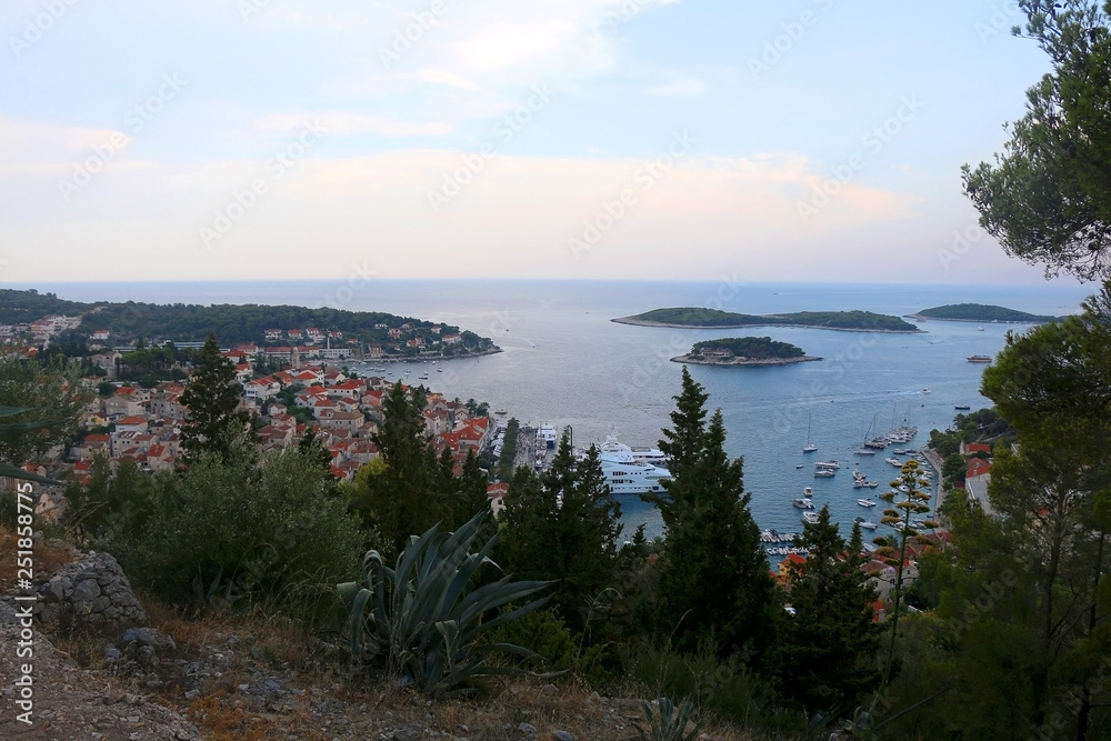 Promenade and archipelago in town Hvar, on island Hvar, Croatia. Hvar is popular usmmer travel destination.