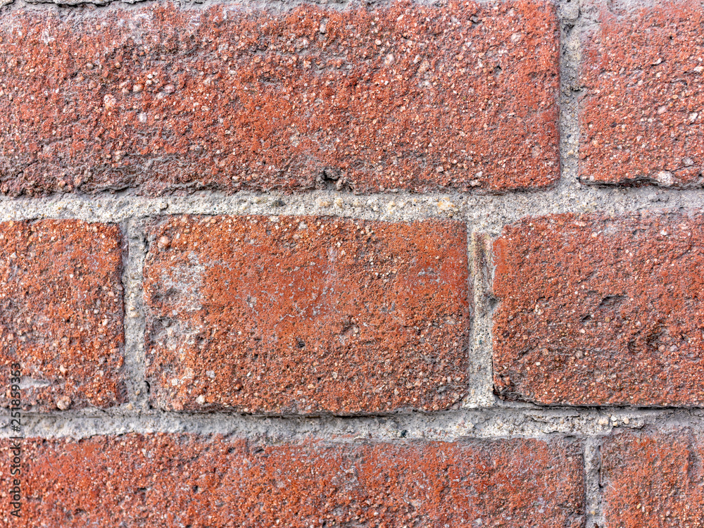 Fragment of a 19th century brick wall. Detailed texture of old bricks. Fragment of a 19th century brick wall. Detailed texture of old bricks.