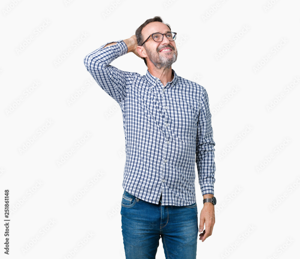 Handsome middle age elegant senior man wearing glasses over isolated background Smiling confident touching hair with hand up gesture, posing attractive