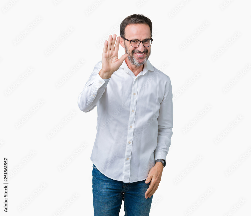 Handsome middle age elegant senior business man wearing glasses over isolated background Waiving saying hello happy and smiling, friendly welcome gesture Handsome middle age elegant senior business man wearing glasses over isolated background Waiving saying hello happy and smiling, friendly welcome gesture