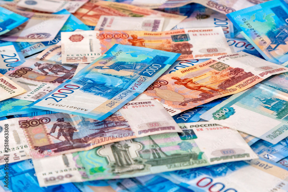 Russian cash money 5000, 2000, 1000, 500 lying on plane. Rubles banknote as background, closeup Russian cash money 5000, 2000, 1000, 500 lying on plane. Rubles banknote as background, closeup