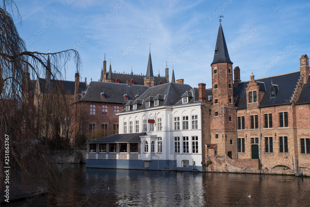  Old typical houses of Bruges in Belgium on the waterfront
