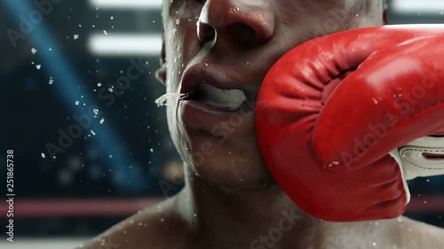 Great punch, boxer punching hook to the jaw, in super slow motion, highly detailed realistic 3d animation photo