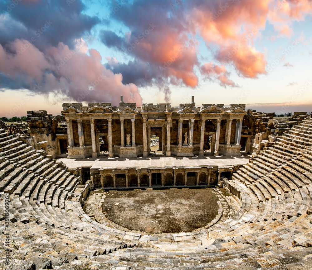 View of the ruins of the ancient city of Hierapolis at sunset.