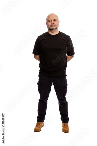 Bald middle-aged man, full-length, isolated on white background