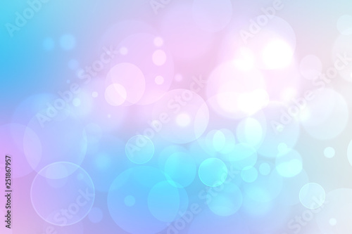 Abstract gradient of pink blue pastel light background texture with glowing circular bokeh lights. Beautiful colorful spring or summer backdrop.