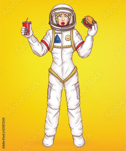Vector pop art surprised astronaut woman in space suit holds burger and cup. Cartoon character in helmet, uniform with fast food isolated on yellow background. Blonde girl, spacewoman for ad poster.