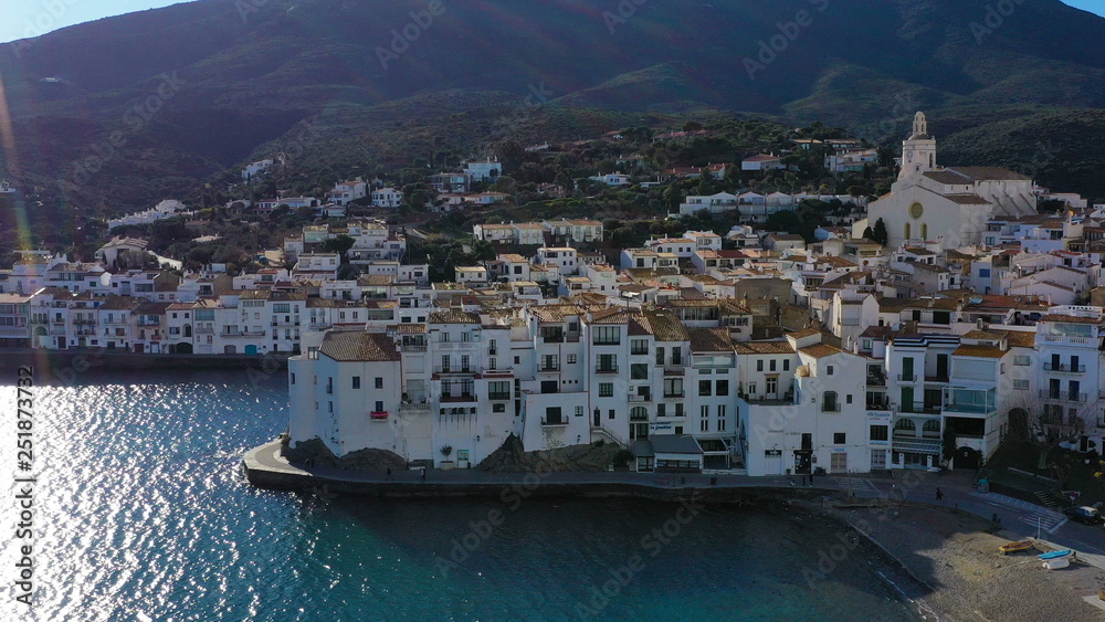 Aerial panoramic view of Cadaques Spain. Curious birds seagulls fly close to the camera. Video footage 4K.