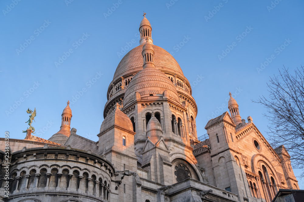 Paris, France - 02 24 2019: Montmartre at sunset. Details of Sacred heart