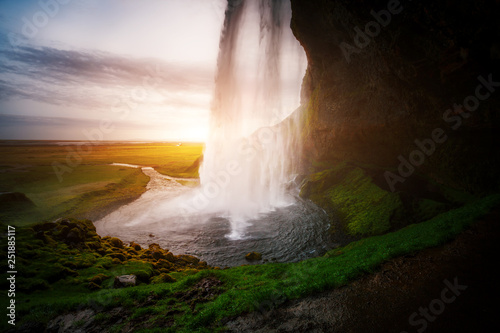 Fototapeta Naklejka Na Ścianę i Meble -  Perfect view of famous powerful Seljalandsfoss waterfall in sunlight. Location place Iceland, sightseeing Europe.