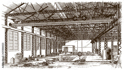 Iron construction of historical factory building in interior view, after engraving from 19th century