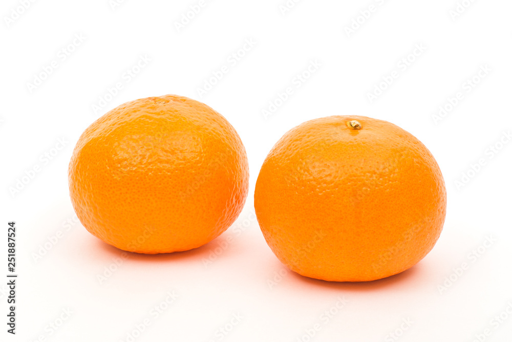 Two orange ripe tangerines in peel on white background, isolated Two orange ripe tangerines in peel on white background, isolated