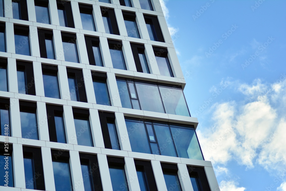 Tthe windows of a modern building for offices Tthe windows of a modern building for offices